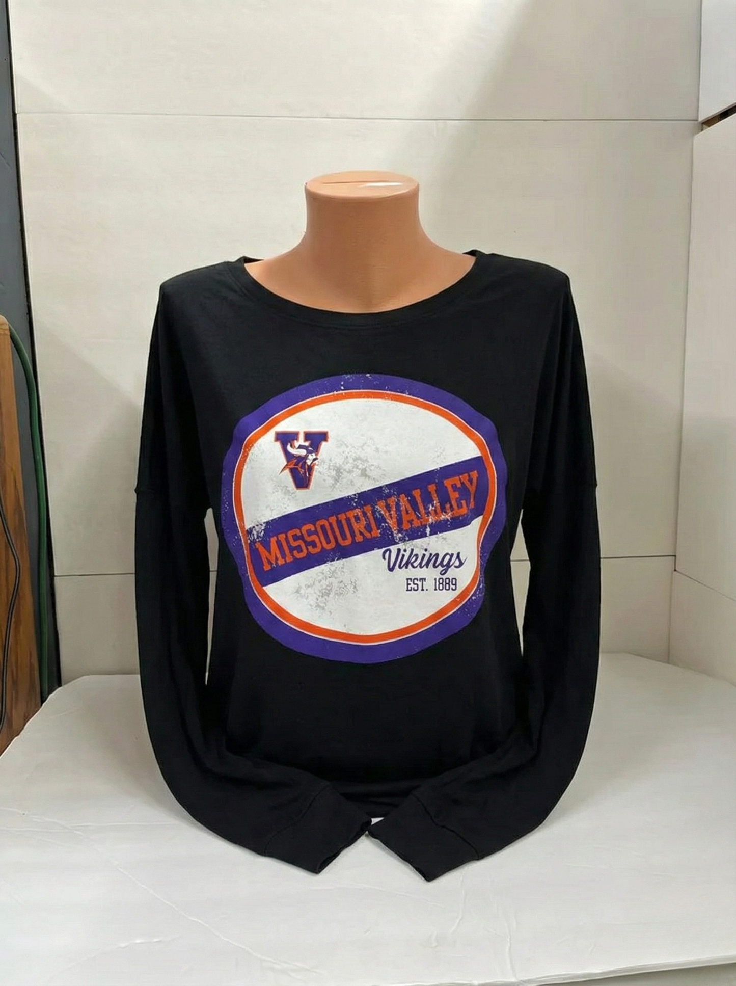 Black long sleeve with 'Missouri Valley Vikings' logo on a mannequin against a white background